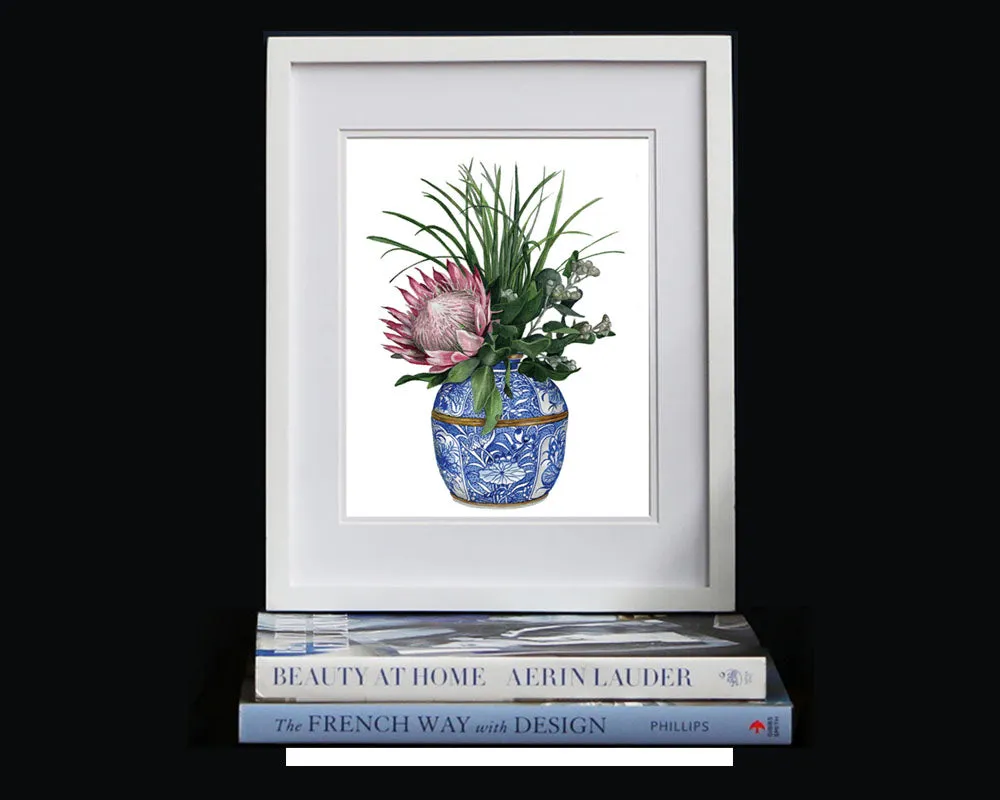 Print of a protea with wattle in a blue and white vase.